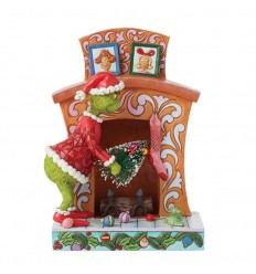 Grinch Pushing Tree up Fireplace Figurine