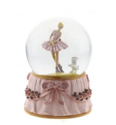 Snow globe, ballerina, and dog
