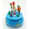 Wooden music box with snowman and child