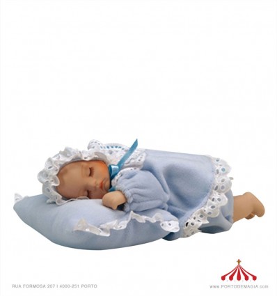 Bèbè- menino espreguiça-se numa almofada